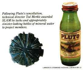 Following Pluto's cancellation, technical director Ted Merkle awarded SLAM tie tacks and appropriately sinister-looking bottles of mineral water to project members.